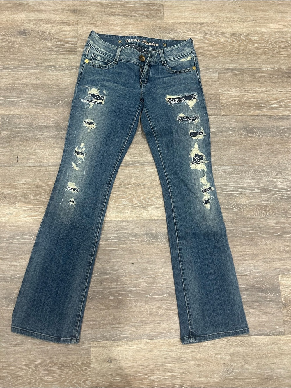 Guess Premium "Daredevil" bootcut jeans feature distressed bandana patches Sz 27